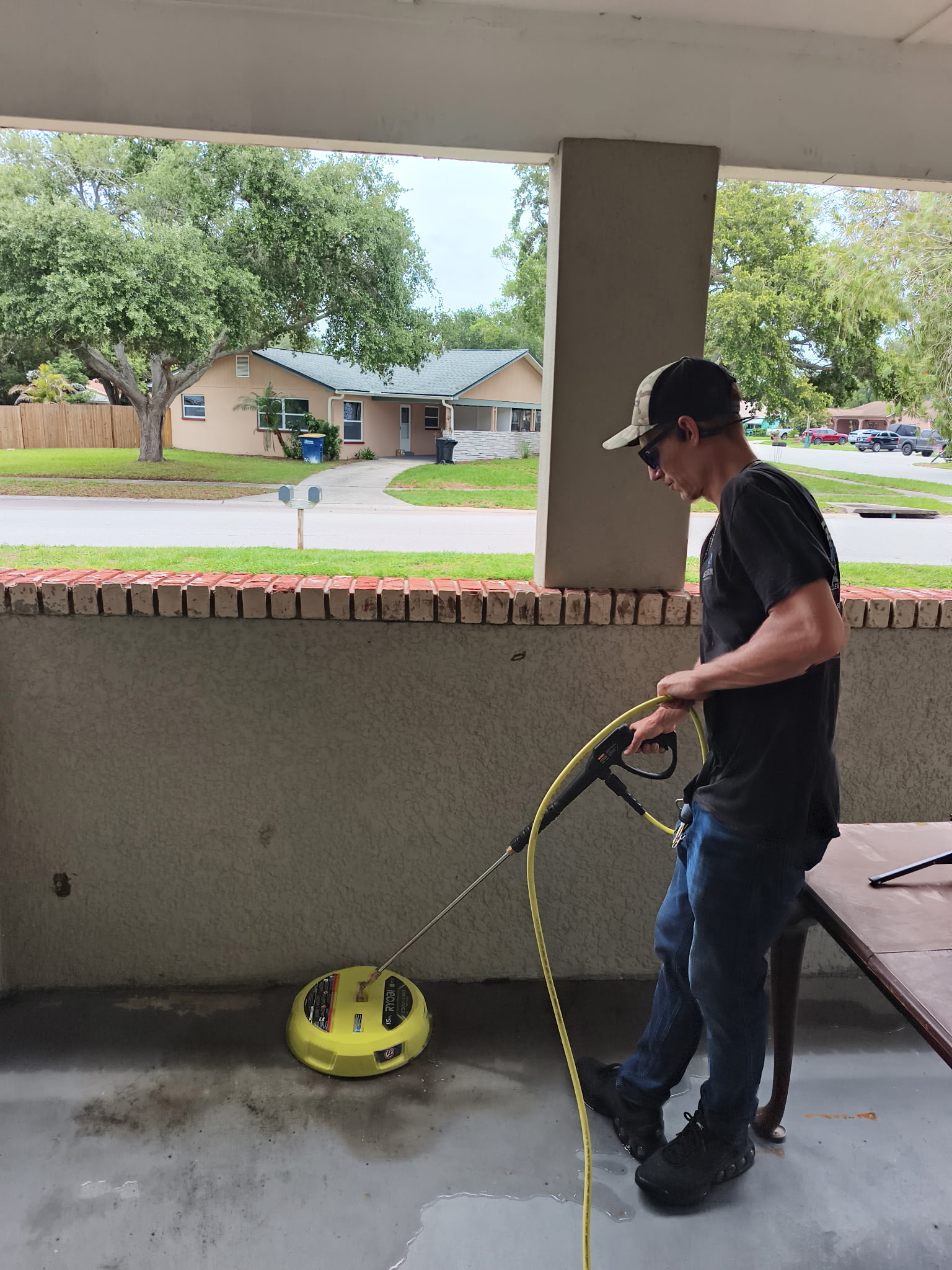 Pressure washing concrete surface